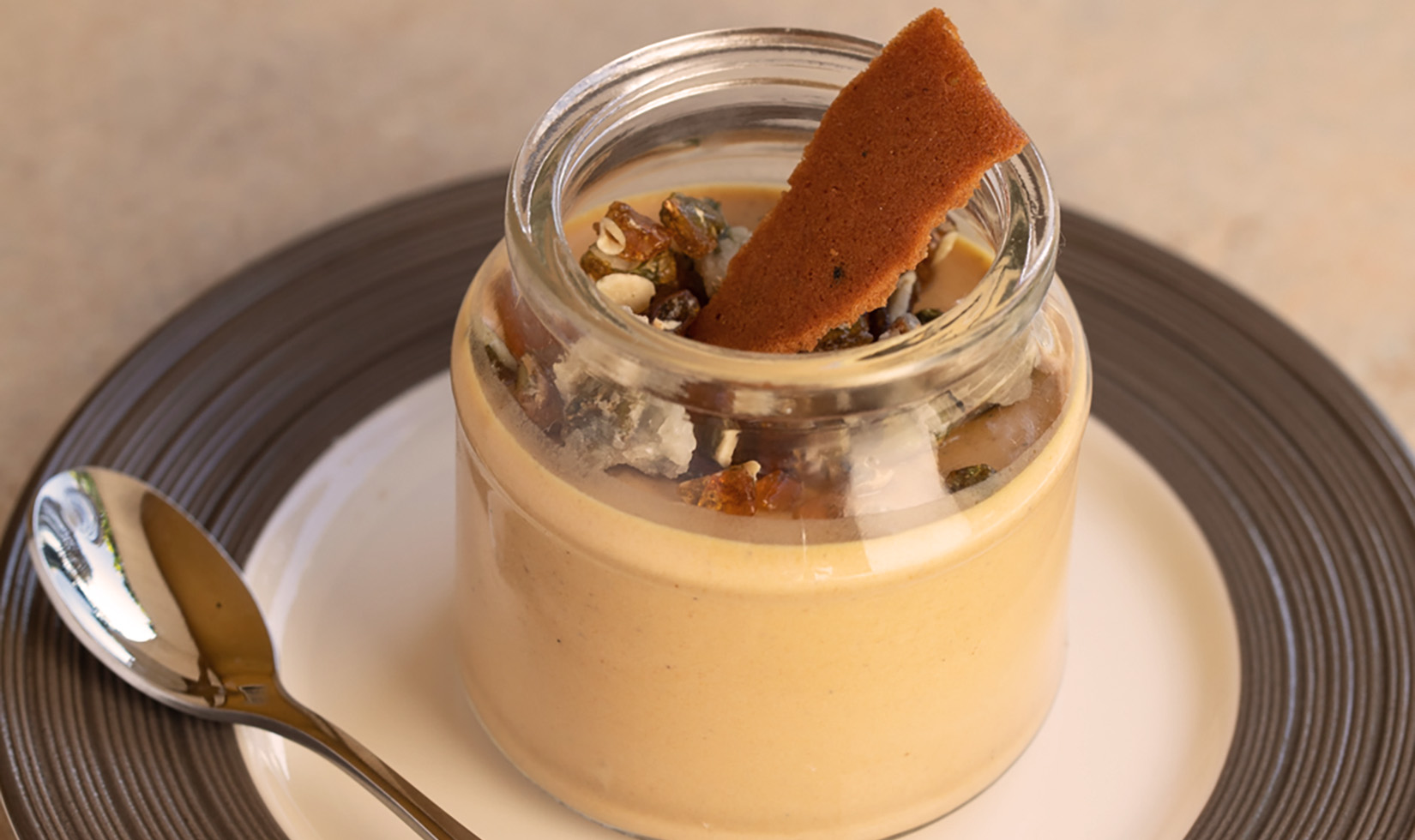 Thanksgiving Dinner Ideas 6 close up of Jordan Winery pumpkin panna cotta dessert in a glass jar