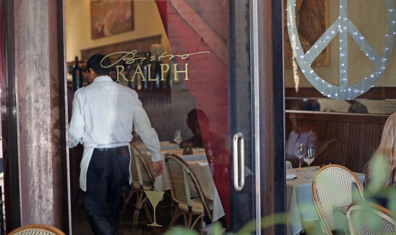 a service crew serving in the restaurant