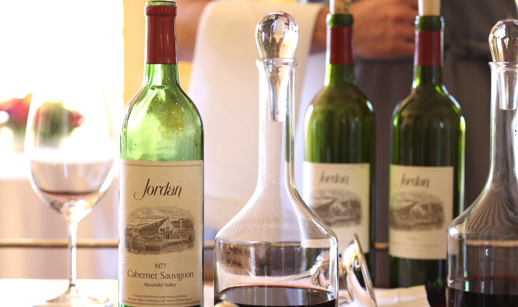 1977 Jordan Alexander Valley Cabernet Sauvignon 3 Jordan Cabernet Sauvignon Wines with wine glass in the table as featured in Wine Country Table