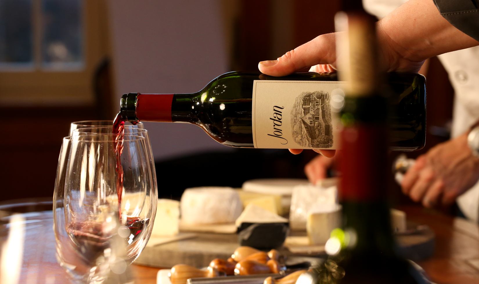 Cheese and Cabernet Sauvignon Pairing wine poured out to wine glass with white cheese