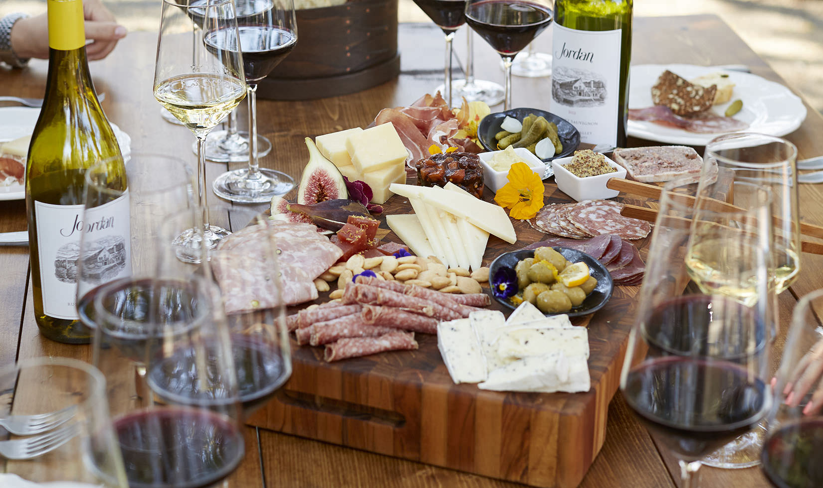 table with full of food and wine pairings