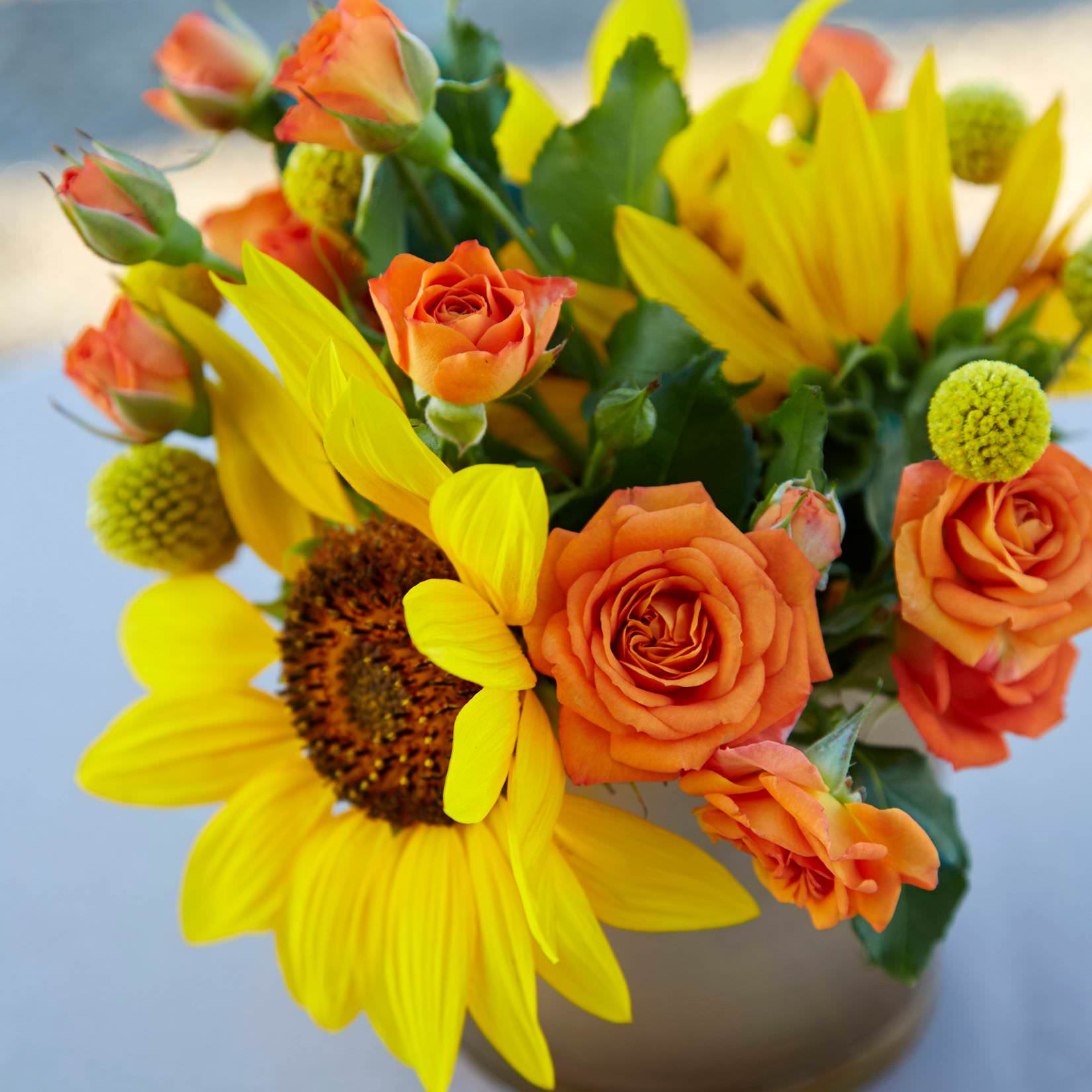 Summer Floral Arrangements Ideas for Home Floral centerpiece with sunflowers and orange spray roses