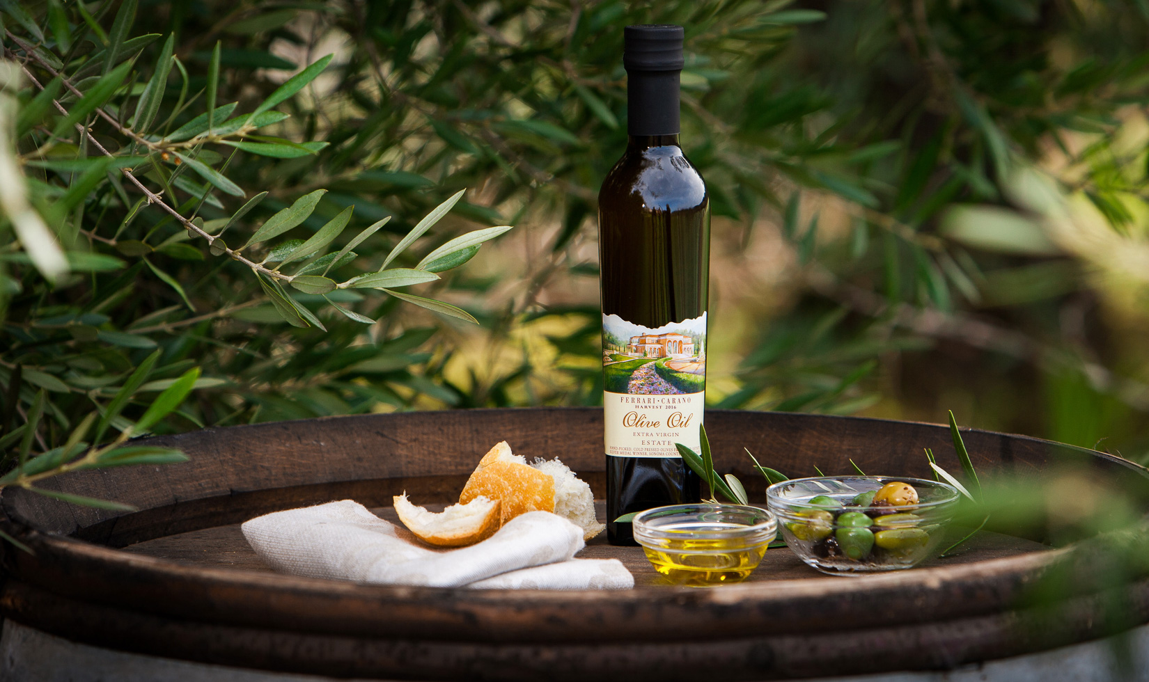Ferrari-Carano Winery Sonoma olive oil in a large plate with leaves background