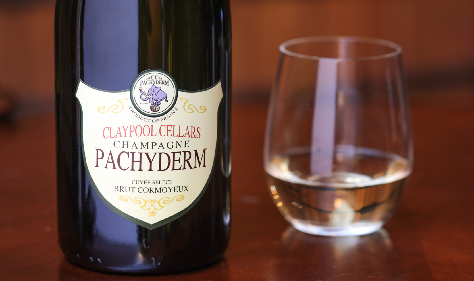 Champagne Wineries in Sonoma Claypool Cellars Champagne Pachyderm with wine glass in the table