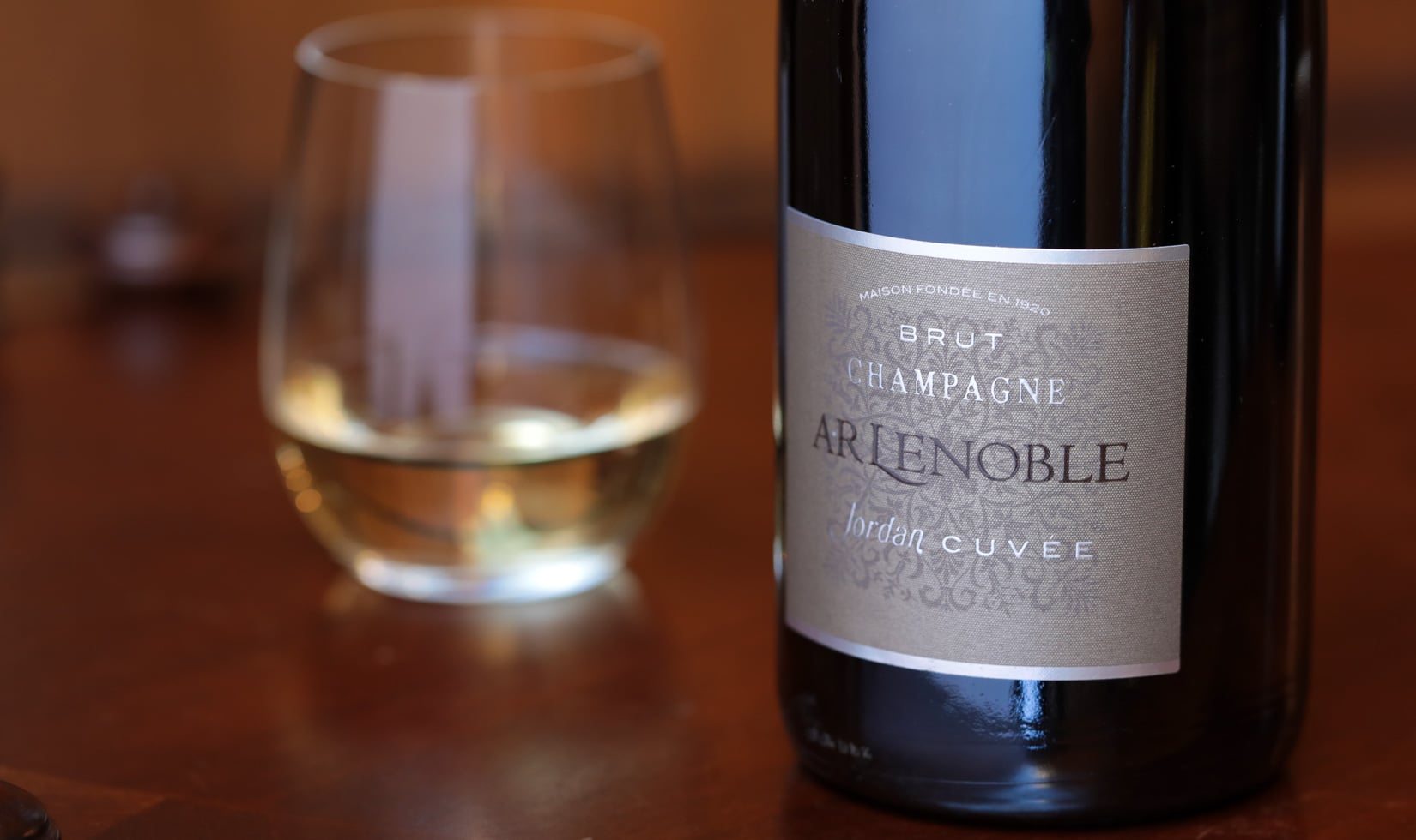 Jordan Cuvee by Champagne AR Lenoble with a poured glass in the background