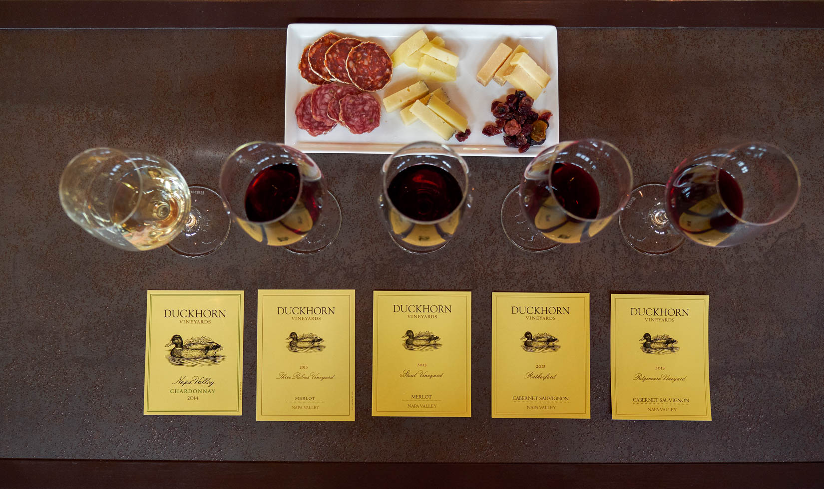 different types of wine glasses with food pairing