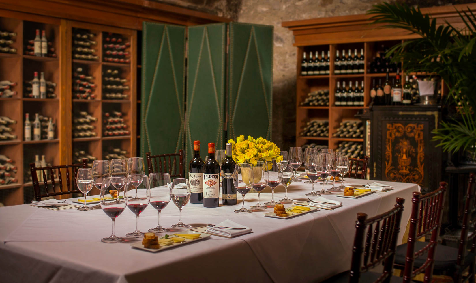 Napa Wine and Cheese Tasting WIneries wine with glasses in a perfect tablesetting with cheese tastings