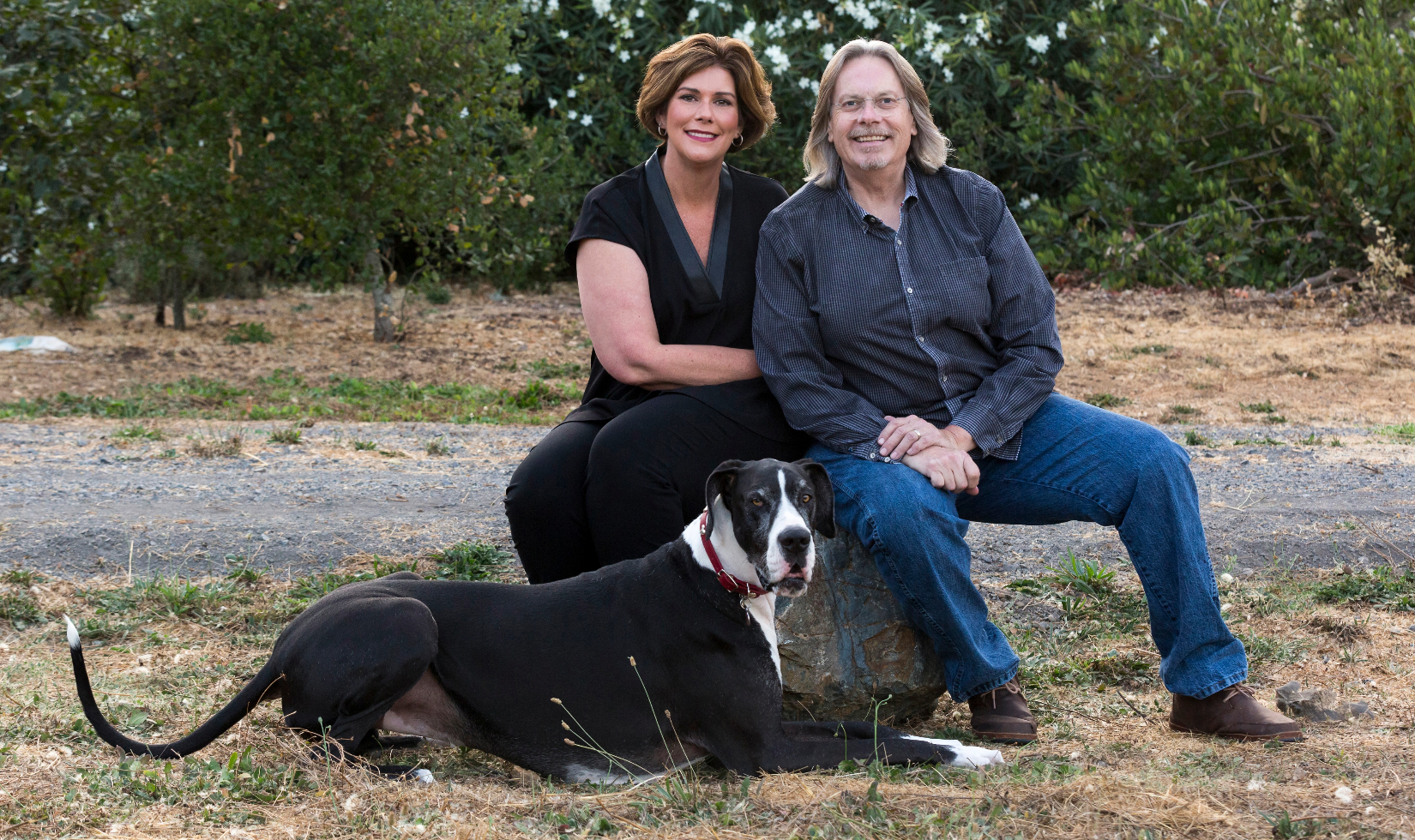 Wine Companies that Donate to Charity 2 Portrait photograph of Bob and Heather Cabral with their dog.