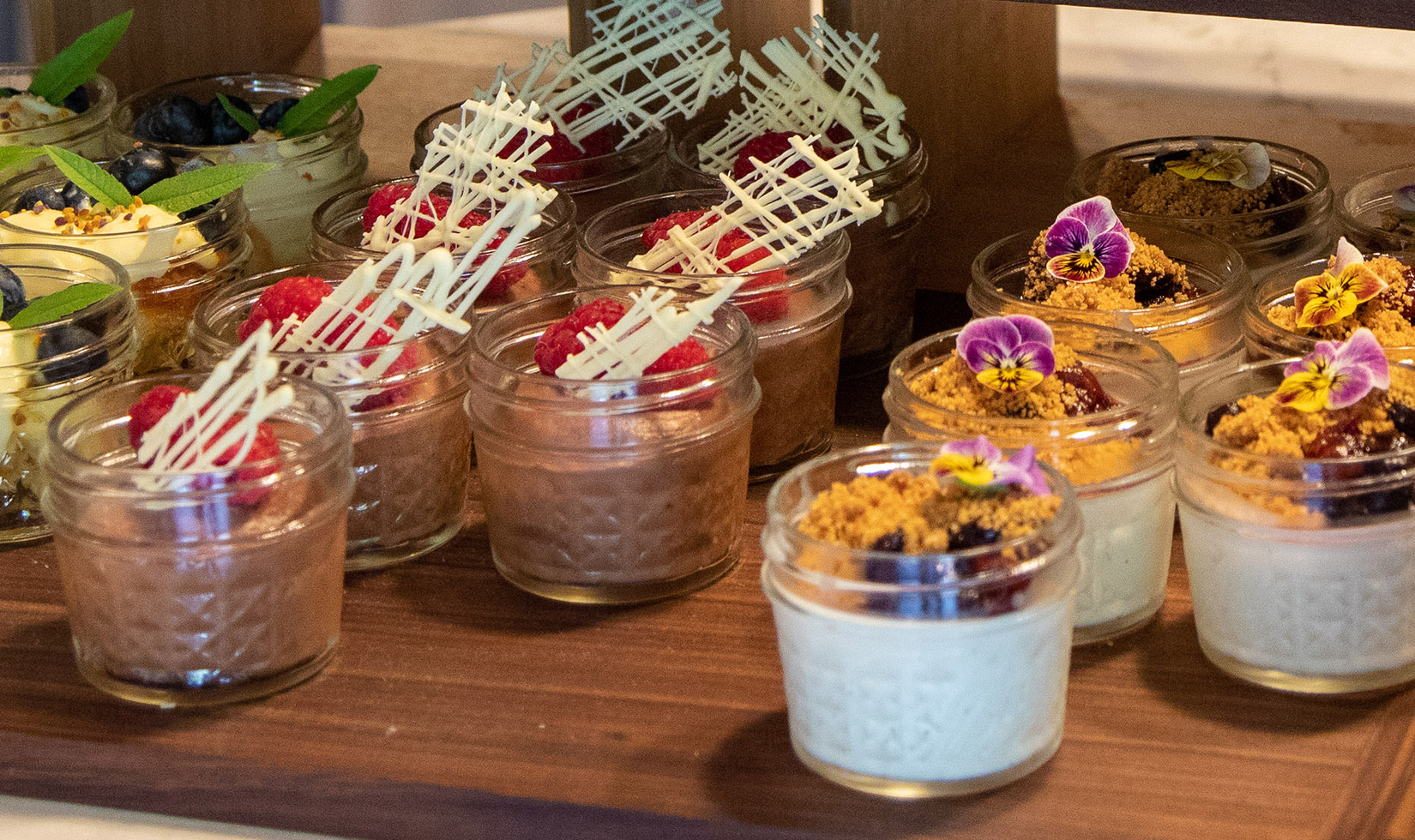 Picnic Snack Ideas Chocolate mousse and panna cotta in mason jars for a picnic dessert