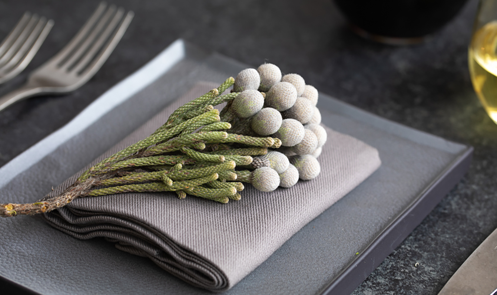 Elegant Christmas Table Setting Ideas Silver Brunia Berries place setting on gray plate