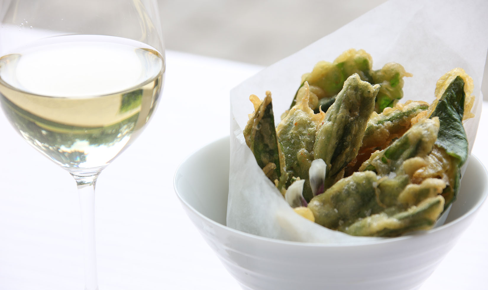 Jordan Winery vegetable tempura in white bowl with Jordan Chardonnay