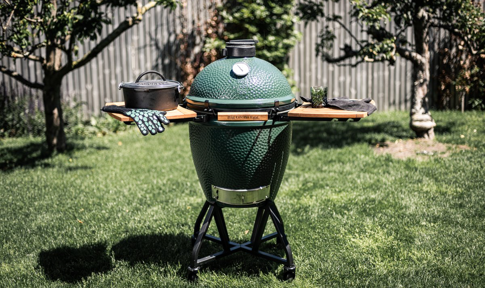 Types of Grills and Smokers a green griller in the outdoor as featured in wine country table