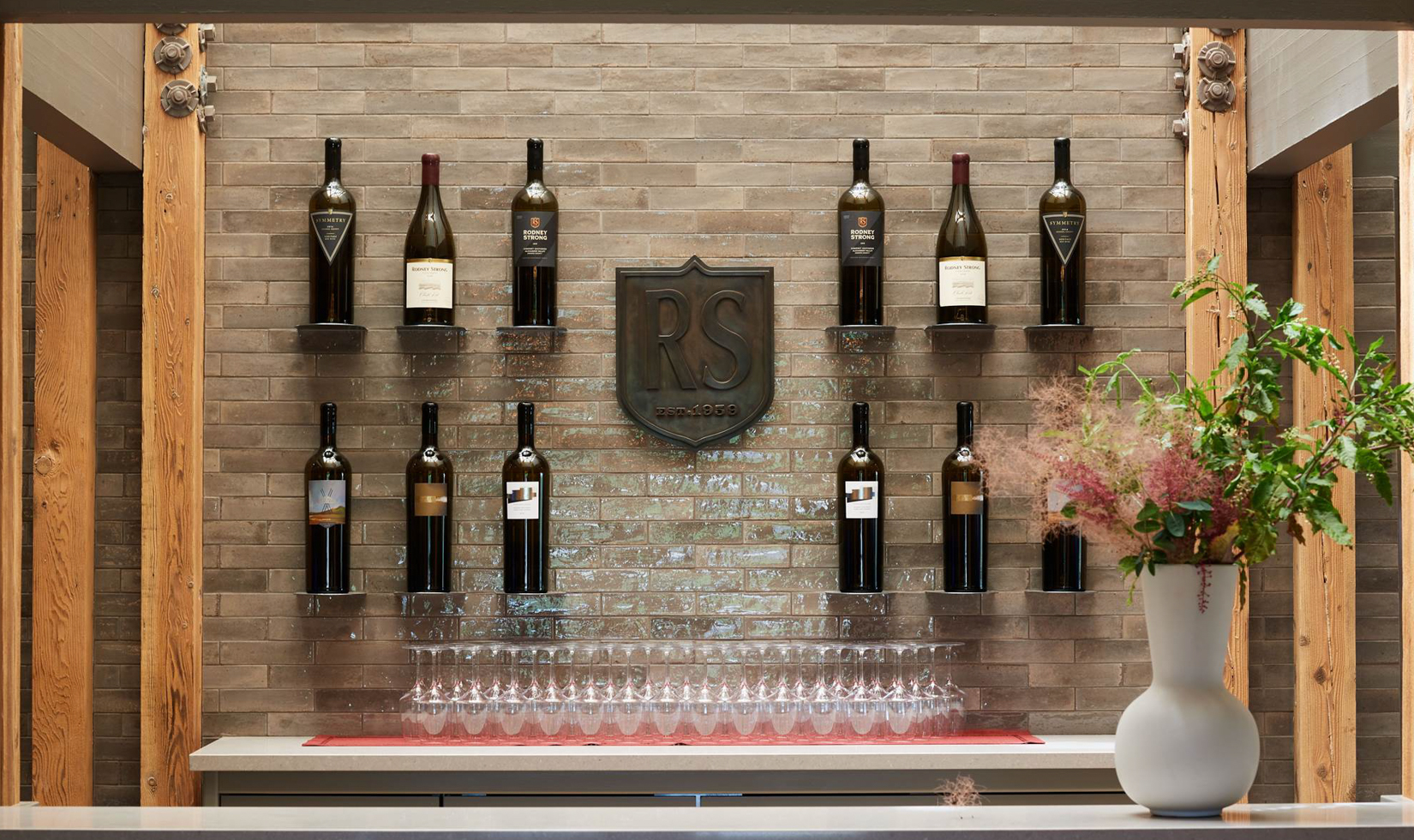 Best Wineries in Healdsburg wall of big bottles of wine